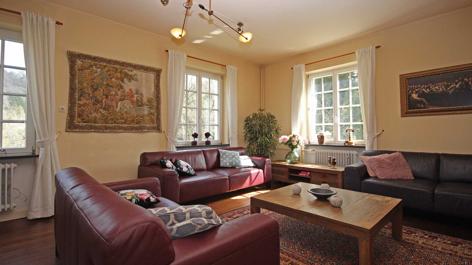 spacious living room with comfortable sofas